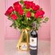24 red roses in a vase with a bottle of wine and chocolates– send flowers to Colombia from Canada